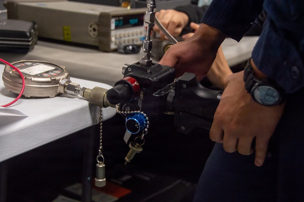 Ronald Reagan Sailors Conduct Maintenance