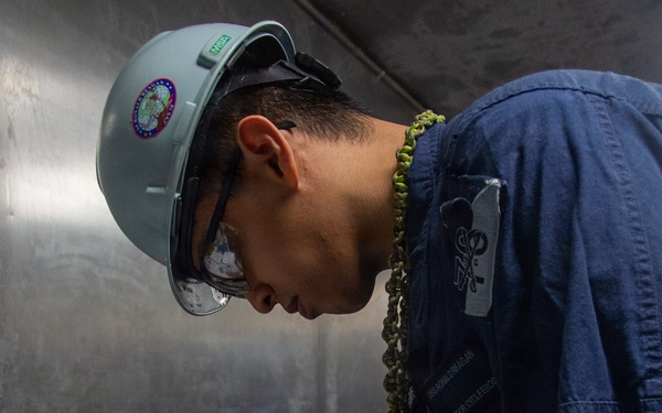 Ronald Reagan Sailors Conduct Maintenance