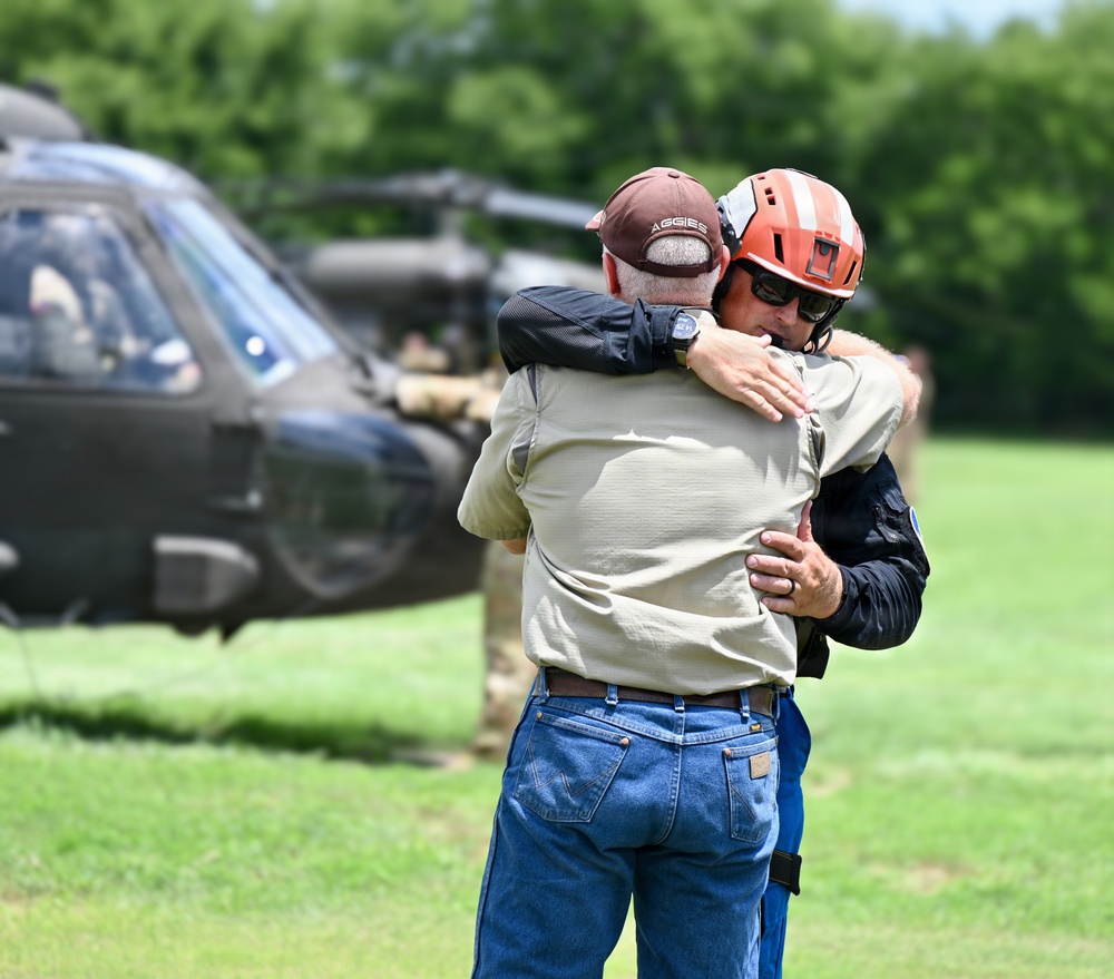 Texas Task Force 1, Army National Guard assist Kerr County engineers in aerial flood damage assessment