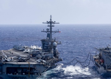 Abraham Lincoln conducts a fueling-at-sea with Henry J. Kaiser