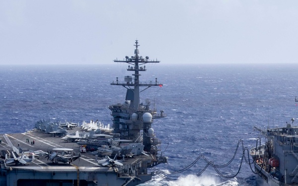 Abraham Lincoln conducts a fueling-at-sea with Henry J. Kaiser