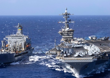 Abraham Lincoln conducts a fueling-at-sea with Henry J. Kaiser