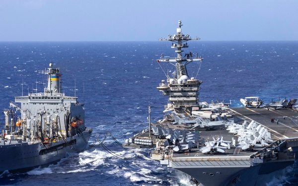 Abraham Lincoln conducts a fueling-at-sea with Henry J. Kaiser