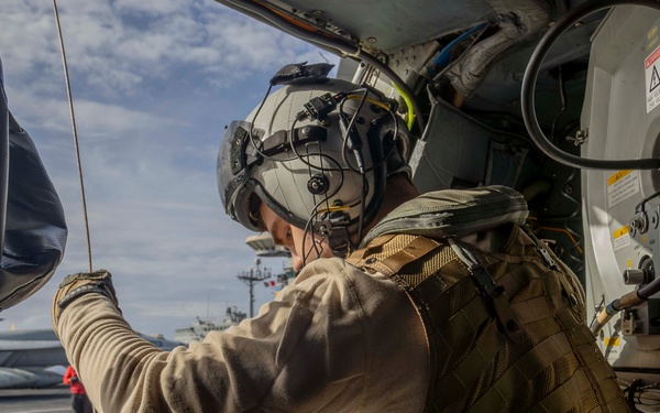 Abraham Lincoln conducts a fueling-at-sea with Henry J. Kaiser