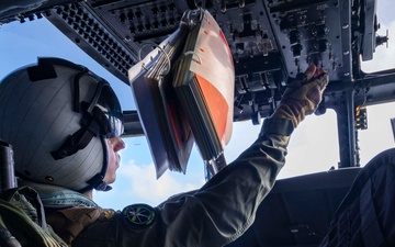 Abraham Lincoln conducts a fueling-at-sea with Henry J. Kaiser