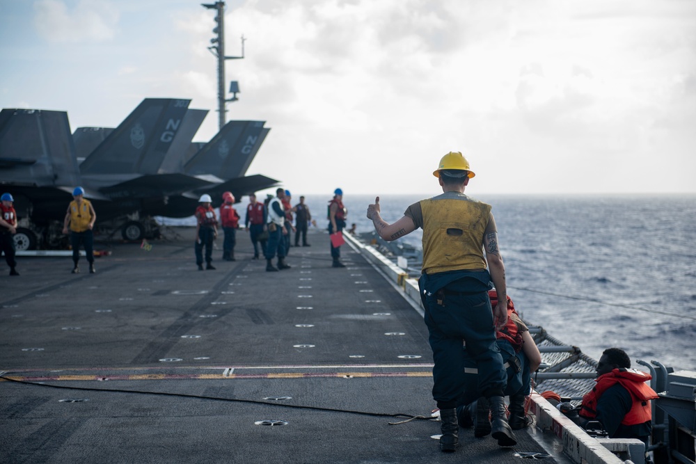 Abraham Lincoln conducts a fueling-at-sea with Henry J. Kaiser