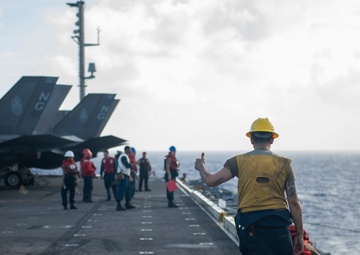 Abraham Lincoln conducts a fueling-at-sea with Henry J. Kaiser