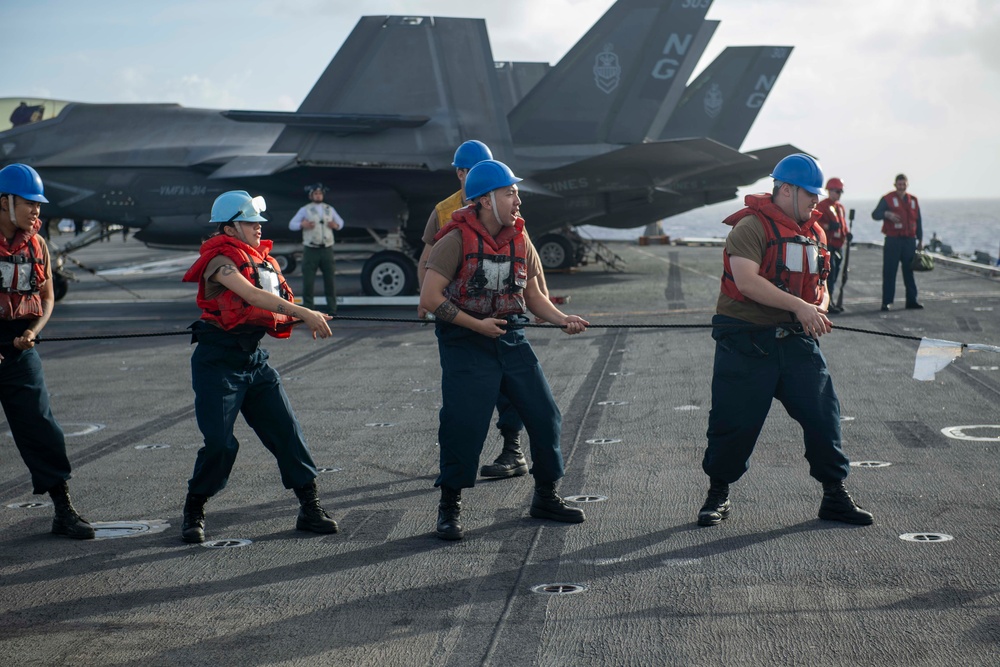 Abraham Lincoln conducts a fueling-at-sea with Henry J. Kaiser