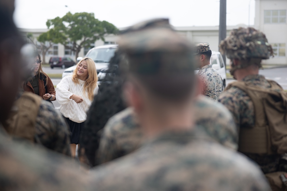 Stamp Fairtex visits 5th Air Naval Gunfire Liaison Company Marines at Camp Hansen