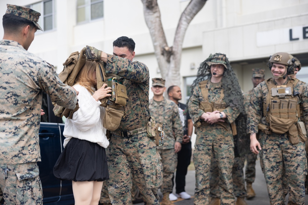 Stamp Fairtex visits 5th Air Naval Gunfire Liaison Company Marines at Camp Hansen