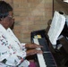 Evans pianist retires after 70 years of chapel music