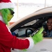 The Grinch spreads Christmas cheer for 379th ESFS defenders