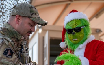 Grinch spreads holiday cheer to 379th ESFS defenders