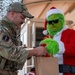 Grinch spreads holiday cheer to 379th ESFS defenders