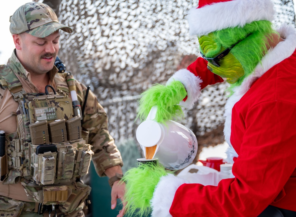 Grinch spreads holiday cheer to 379th ESFS defenders