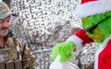 Grinch spreads holiday cheer to 379th ESFS defenders