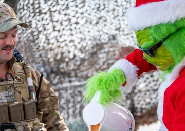 Grinch spreads holiday cheer to 379th ESFS defenders