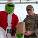 Grinch spreads holiday cheer to 379th ESFS defenders