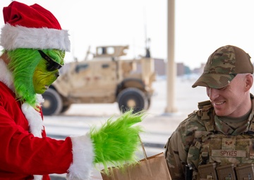 Grinch spreads holiday cheer to 379th ESFS defenders