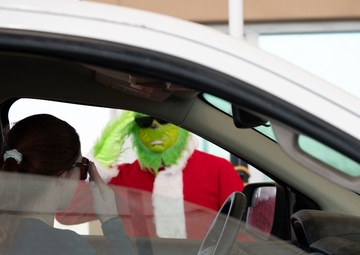 Grinch spreads holiday cheer to 379th ESFS defenders