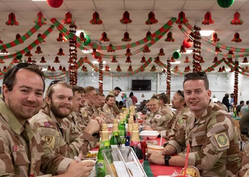 Soldiers are served a Holiday dinner at Erbil Air Base