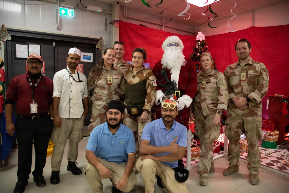 Soldiers are served a Holiday dinner at Erbil Air Base