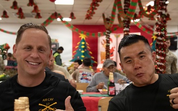 Soldiers are served a Holiday dinner at Erbil Air Base