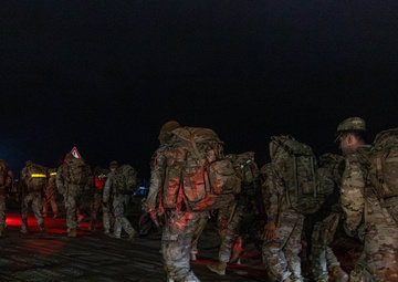 Best By Test participants navigate the night on a ruck