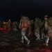 Best By Test participants navigate the night on a ruck