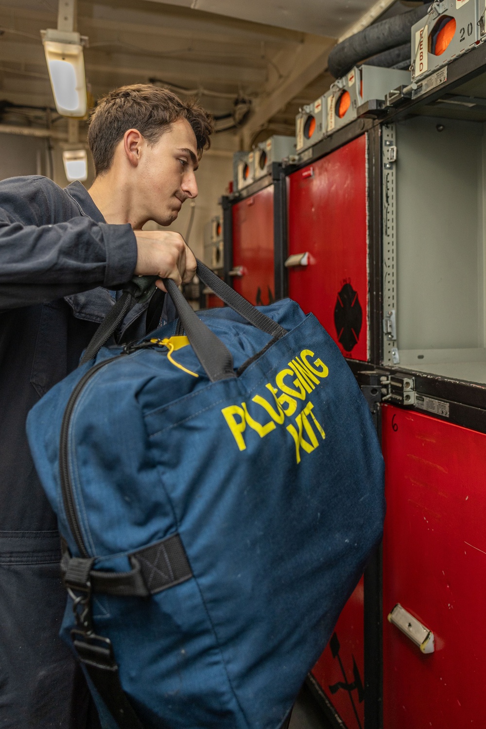 Iwo Jima Sailor Inventories Repair Locker