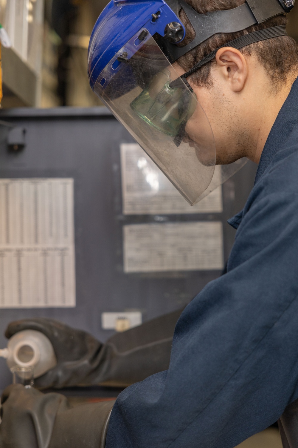 Iwo Jima Sailor Tests Oil