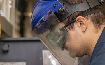 Iwo Jima Sailor Tests Oil