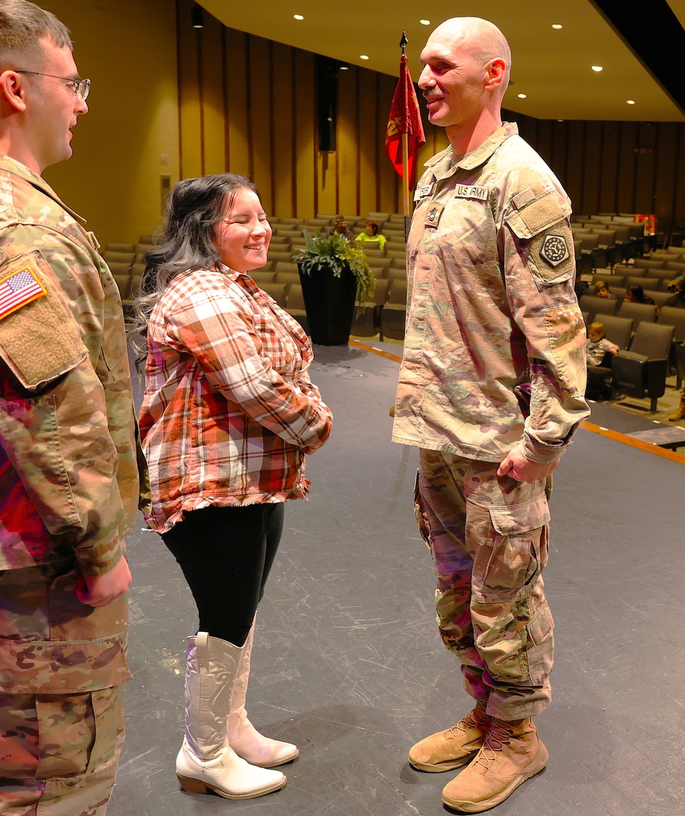 ILLINOIS ARMY NATIONAL GUARD SOLDIER PROMOTED AFTER 725th TRANSPORTATION COMPANY WELCOME HOME CEREMONY