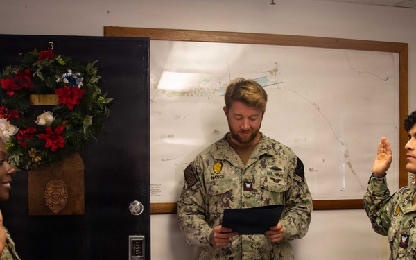 MA2 Cerezo reenlists in the Navy