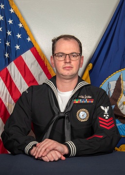 Navy Recruiter Poses For Portrait