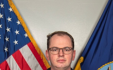 Navy Recruiter Poses For Portrait