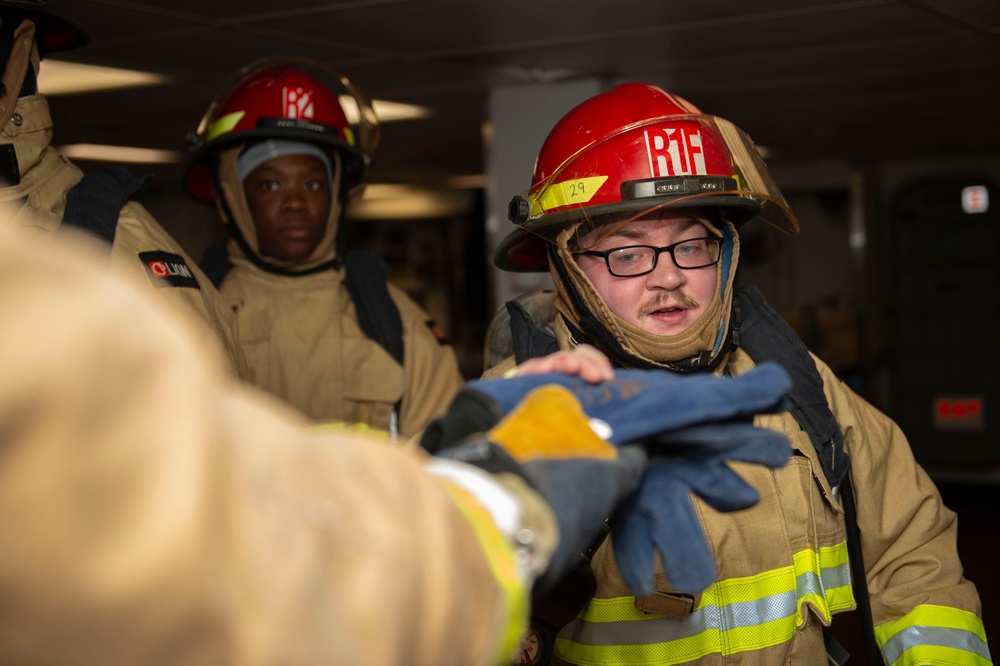 Sailors participate in damage control drill