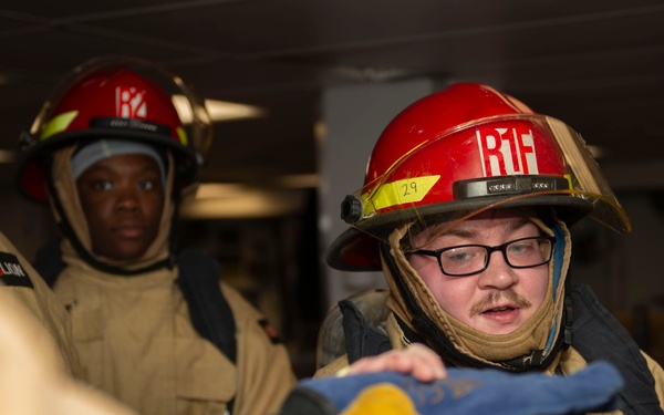 Sailors participate in damage control drill