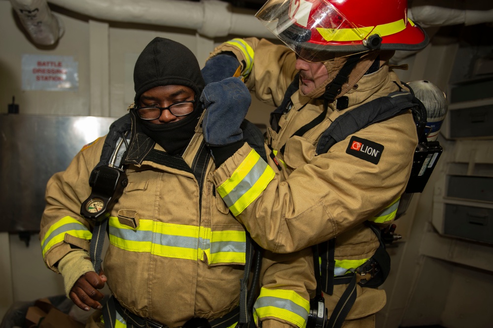 Sailors participate in damage control drill