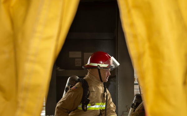Sailors participate in damage control drill