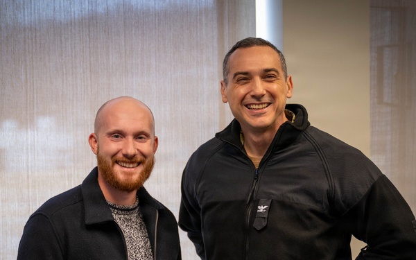 Carderock Administrative/Technical Specialist Landon Transeau receives command coin