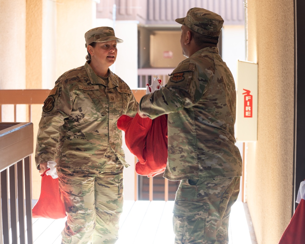 First sergeants deliver treats to dorm Airmen in the Holloman Airmen Cookie Drive
