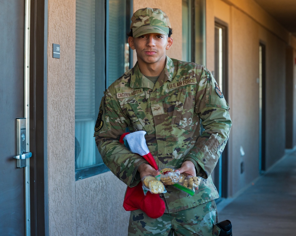 First sergeants deliver treats to dorm Airmen in the Holloman Airmen Cookie Drive