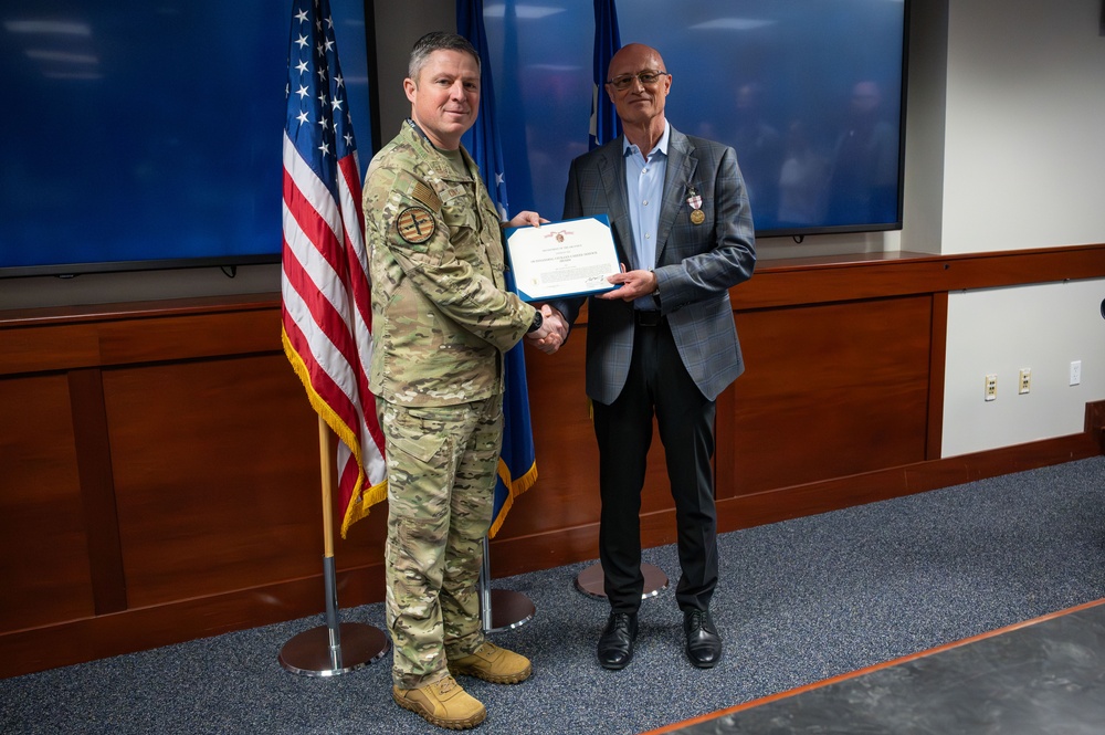 After decades of service, AFSOC director of financial management retires