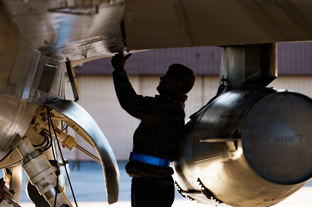 311th Aircraft Maintenance Unit works on F-16 Fighting Falcons day and night