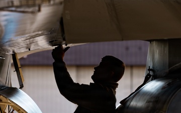 311th Aircraft Maintenance Unit works on F-16 Fighting Falcons day and night