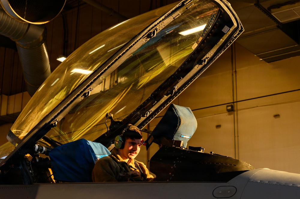 311th Aircraft Maintenance Unit works on F-16 Fighting Falcons day and night