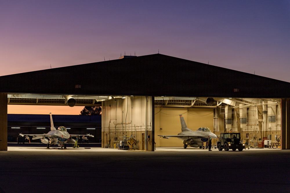 311th Aircraft Maintenance Unit works on F-16 Fighting Falcons day and night
