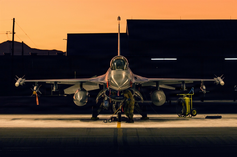 311th Aircraft Maintenance Unit works on F-16 Fighting Falcons day and night