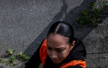 Marines volunteer in vine removal event to aide Okinawa City residents